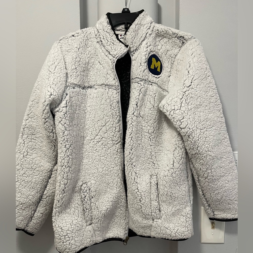 Champion fluffy coat. Size s Michigan logo on it.